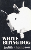 white biting dog